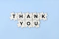 Thank you phrase on wooden puzzle