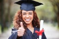 Thank you, portrait of woman with thumbs up and on graduation day outside of campus with certificate. University or