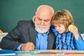 Thank You Teacher. Individual teaching. Teacher with male elementary school pupil with problem. Professor and pupil in Royalty Free Stock Photo