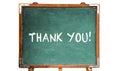 Thank you! text message in white chalk letters written on a school green old grungy vintage wooden chalkboard or blackboard frame