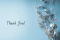 Thank You text on soft blue background with sparkles Royalty Free Stock Photo