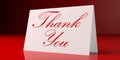 Thank you text on white card, isolated on red background. Royalty Free Stock Photo