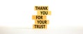 Thank you for trust symbol. Concept words Thank you for your trust on wooden blocks on a beautiful white table white background. Royalty Free Stock Photo