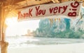 `Thank You very BIG` sign in exotic bungalow on the sandy Thai beach. Tropic vacation concept image