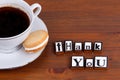 Thank You. On wooden table coffee mug, cookie