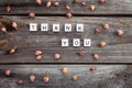 Thank you words is made of bright wood cubes on a dark wooden background Royalty Free Stock Photo
