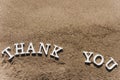 Thank you word drawn on the beach sand Royalty Free Stock Photo