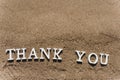 Thank you word drawn on the beach sand Royalty Free Stock Photo