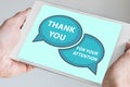 Thank you for your attention concept with hand holding modern touch screen device like tablet to be used as slide background