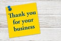 Thank you for your business message on a yellow sticky note paper with pushpin Royalty Free Stock Photo