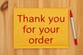 Thank you for your order message on yellow bubble mailing envelope