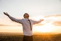 Thankful Businessman with Open Arms at the Field Royalty Free Stock Photo