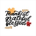 Thankful, grateful, blesed. Happy harvest quoteh. Hand lettering phrase with autumn color red maple leave. Thanksgiving harvwst