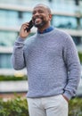 Thanks for calling. a handsome mature businessman making a phonecall while out in the city. Royalty Free Stock Photo