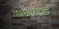 THANKS - Glowing Neon Sign on stonework wall - 3D rendered royalty free stock illustration