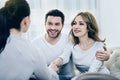 Beautiful delighted woman shaking the therapists hand Royalty Free Stock Photo