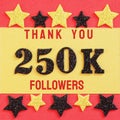 Thanks 250K, 250000 followers. message with black shiny numbers on red and gold background with black and golden shiny stars