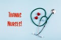 Thanks Nurses Card. Medical stethoscope, two red hearts. Healthcare medicine concept Royalty Free Stock Photo