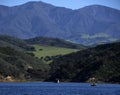 Cachuma Lake sparkles full and blue beneath Santa Ynez Mountains Royalty Free Stock Photo