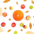 Thanksgiving autumn background with fall dried leaves, apple fruits and orange pumpkin on white background. Flat lay, top view Royalty Free Stock Photo