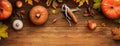 A Thanksgiving autumn harvest background of pumpkins, pears, leaves and corncobs Royalty Free Stock Photo