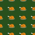 Thanksgiving autumnal seamless pattern with roasted turkeys on a plate, green background