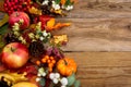 Thanksgiving background with apples, golden maple and oak leaves Royalty Free Stock Photo