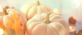 Thanksgiving background. Holiday scene. Wooden table, decorated with pumpkins, autumn leaves