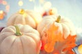 Thanksgiving background. Wooden table, decorated with pumpkins, autumn leaves and candles Royalty Free Stock Photo