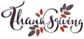 Thanksgiving calligraphy text and autumn aspberry leaf for greeting card