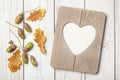 Thanksgiving card with oak leaves, acorns and heart shaped frame Royalty Free Stock Photo
