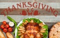 Thanksgiving or Christmas. Homemade roasted whole turkey on wooden table. Thanksgiving Celebration Traditional Dinner Setting Royalty Free Stock Photo