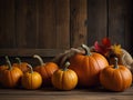 Thanksgiving day autumnal still life with pumpkins on old wooden