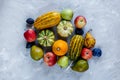 Thanksgiving day composition of vegetables and fruits on gray background. Autumn harvest concept.