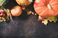 Thanksgiving day concept. Autumn table setting for dinner with plate, knife, fork decorated pumpkins and maple leaves. Flat lay Royalty Free Stock Photo
