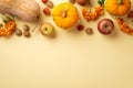 Thanksgiving day concept. Top view photo of raw vegetables pumpkins gourd apples walnuts rowan berries and physalis on isolated