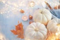 Thanksgiving Day dinner. Holiday served table decorated with pumpkins, autumn bright colorful leaves Royalty Free Stock Photo