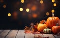 Thanksgiving day with pumpkins and maple leaves on dark bokeh lights background. Autumn composition with copy space. Wooden table Royalty Free Stock Photo