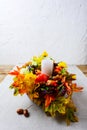 Thanksgiving decoration with silk fall leaves on linen napkin, v Royalty Free Stock Photo