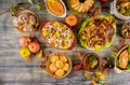 Thanksgiving dinner. Roasted turkey with apple pie, pumpkin and cinnamon rolls Royalty Free Stock Photo