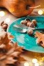 Thanksgiving Dinner. Thanksgiving wooden table served, decorated with bright autumn leaves. Holiday Table setting Royalty Free Stock Photo