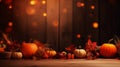 Thanksgiving and fall harvest season. Pumpkins, grape, apple and leaves over dark wood background