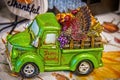 Thanksgiving farm truck table decoration - back filled with turkey and harvest produce - Give Thanks written on door -selective