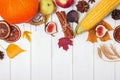 Thanksgiving flat lay with autumn harvest, spices and yellow leaves