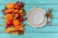 Autumn table setting, menu composition, vintage cutlery, sliced pumpkin. Royalty Free Stock Photo