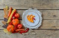 Autumn table setting, menu composition, vintage cutlery, sliced pumpkin. Royalty Free Stock Photo