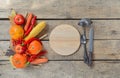 Autumn table setting, menu composition, vintage cutlery, sliced pumpkin. Royalty Free Stock Photo