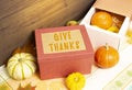 Thanksgiving gift boxes with fruits and vegetables on the table. Autumn harvest at a time of abundance. Royalty Free Stock Photo