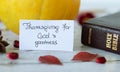 Thanksgiving for God`s goodness, a handwritten note with Holy Bible and pumpkin