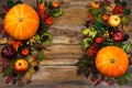 Thanksgiving greeting with leaves and pumpkin on wooden table Royalty Free Stock Photo